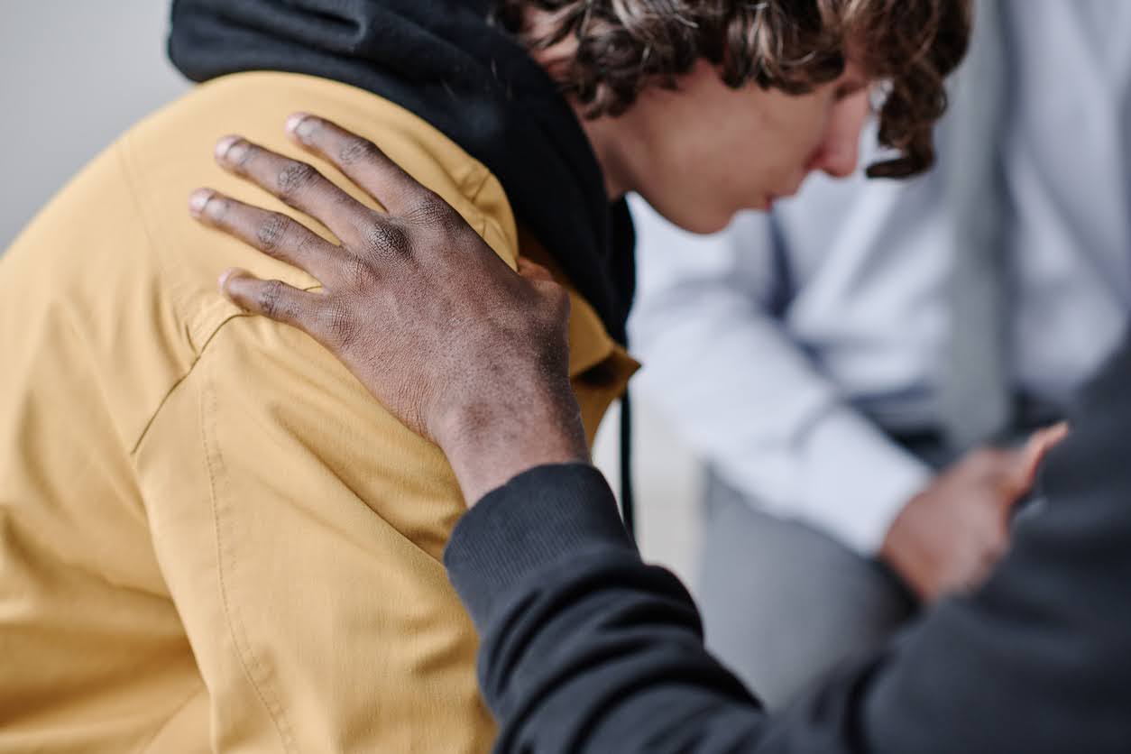 Young person receiving emotional support from a counsellor during youth mental health counselling session in Sydney.